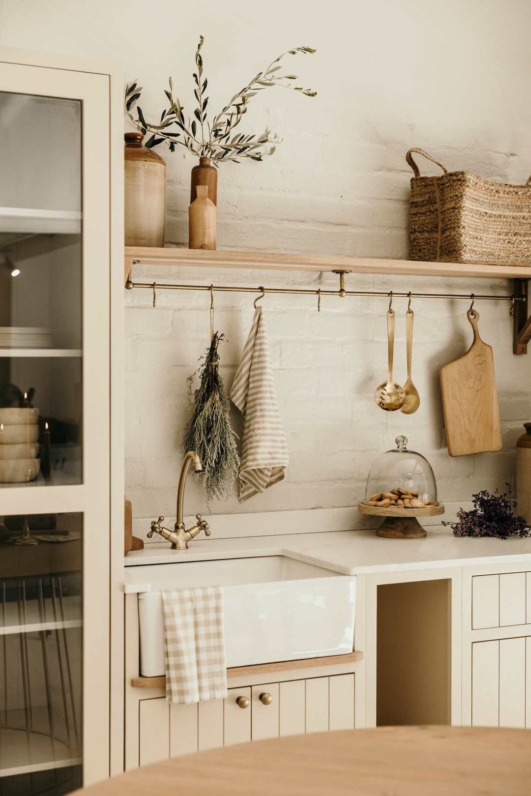 Shaker style kitchen display in Cape Town showroom featuring Springbok Chest colour cabinetry.